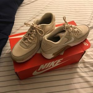 Nike oatmeal Airmax shoes.